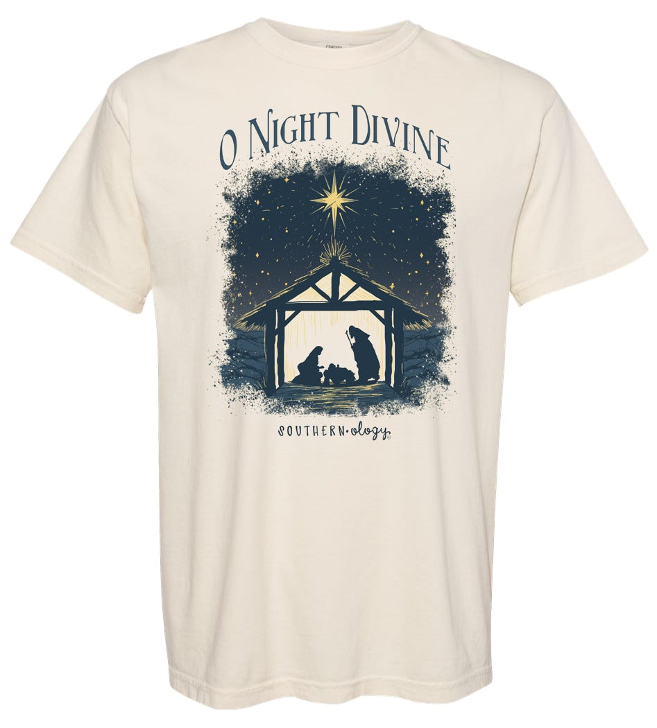 An off-white short-sleeve t-shirt with a dark navy blue graphic on the front featuring a star, a stable, and the text 'O Night Divine' and 'Southernology'.